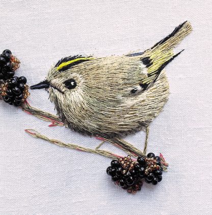 Goldcrest with brambles