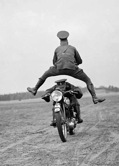 Man leaping motorcycle