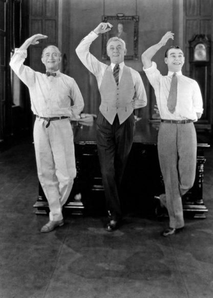 Three men dancing