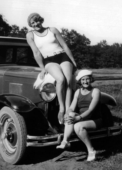 Two women on car