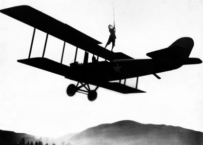 Stuntwoman on plane