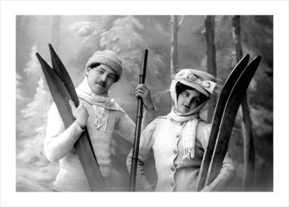 Couple wearing hats and carrying skis