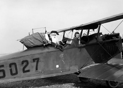 Father Christmas in bi-plane