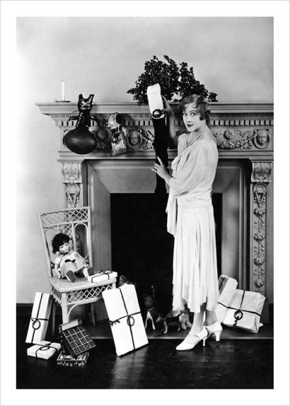 Woman by chimney with presents