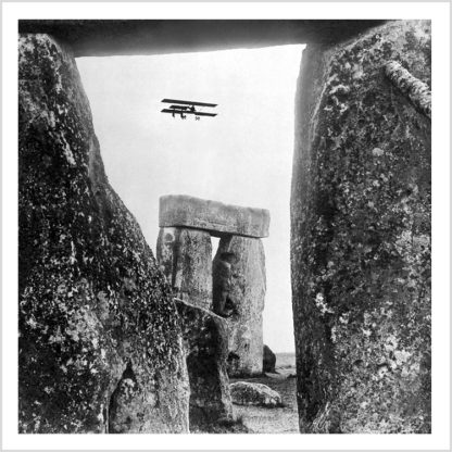 Biplane over Stonehenge