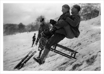 Young men on sledge on Hampstead Heath