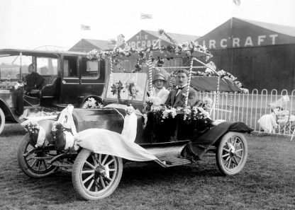 Couple in car with flowers