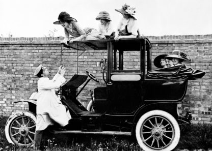 Driver with women on car