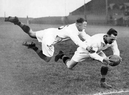 Flying rugby tackle